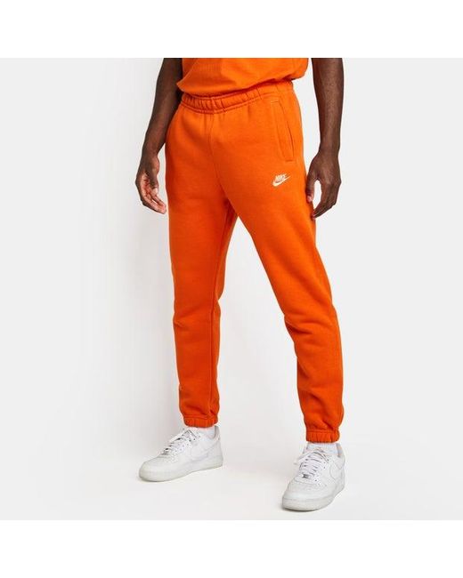 Club Pantalones Nike de hombre de color Orange
