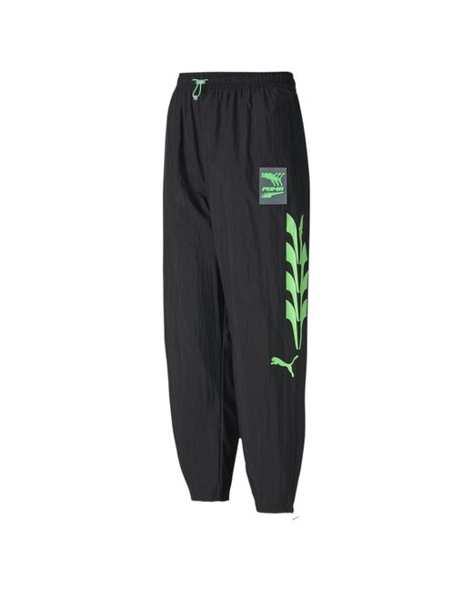 PUMA Evide Woven Track Pants in Black | Lyst