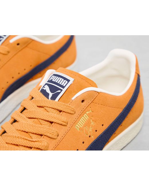Puma clyde on sale orange