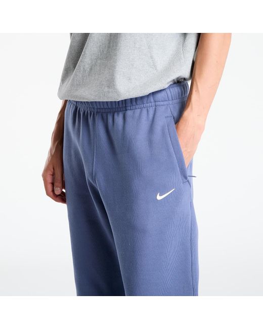 Pantalons x nocta fleece cs sweatpants diffused blue/ citron tint l Nike pour homme
