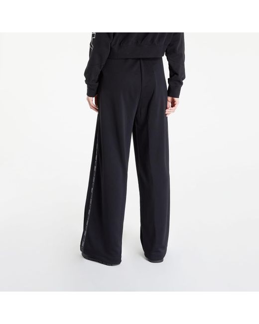 Nike Nsw Pocket Tape Trend High-rise Pants in het Black