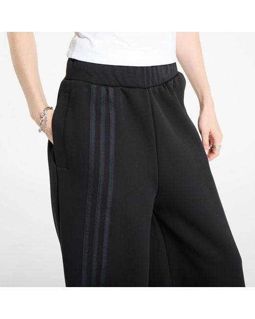 Pantalons adidas off placed 3-stripes wide pant m Adidas Originals en coloris Black