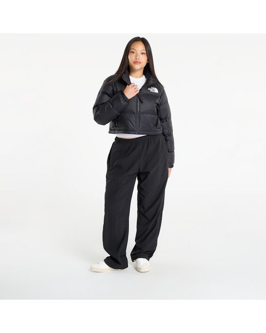 Giacca W Nuptse Short Jacket Tnf/ Tnf di The North Face in Black