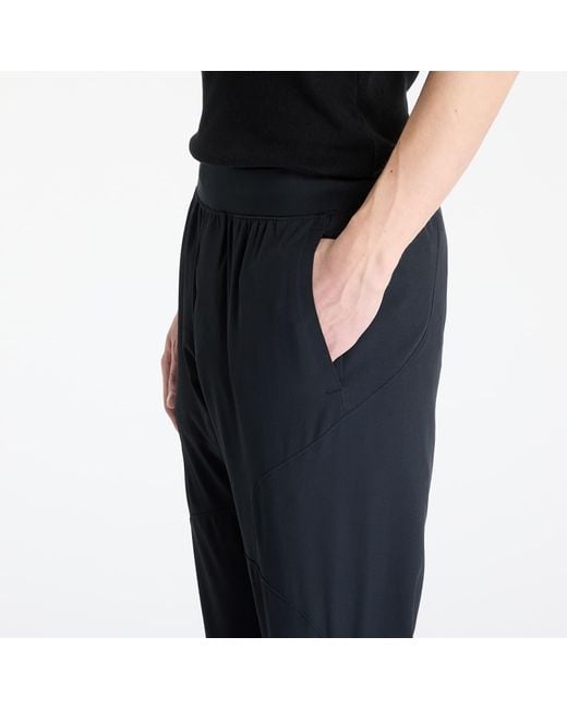 Under Armour Broeken Unstoppable Tapered Pants Pitch in het Blue