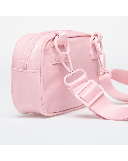 Alpha camera bag Nike en coloris Pink