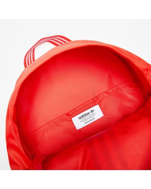 red and white adidas backpack