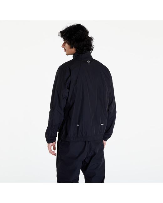 Giacca X Nocta Woven Track Jacket di Nike in Blue da Uomo