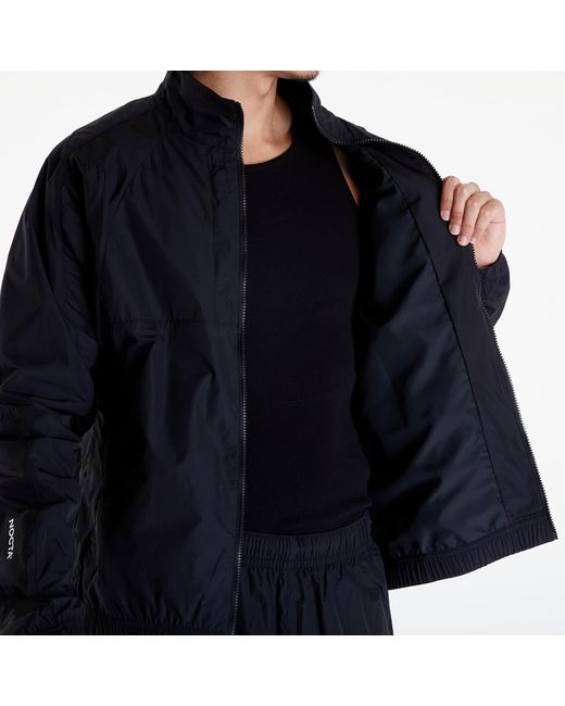 Giacca X Nocta Woven Track Jacket di Nike in Blue da Uomo