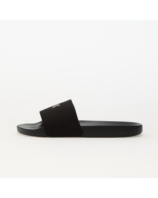 Sneakers Jeans Slide Monogram Hardw Eur di Calvin Klein in Black