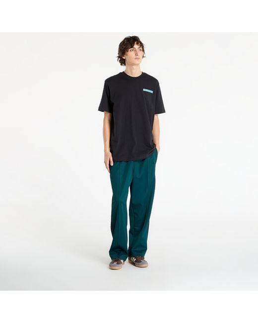 Adidas Originals Green Pants Adidas Adicolor Baggy Fit Firebird Track Pants Aurora Ivy for men