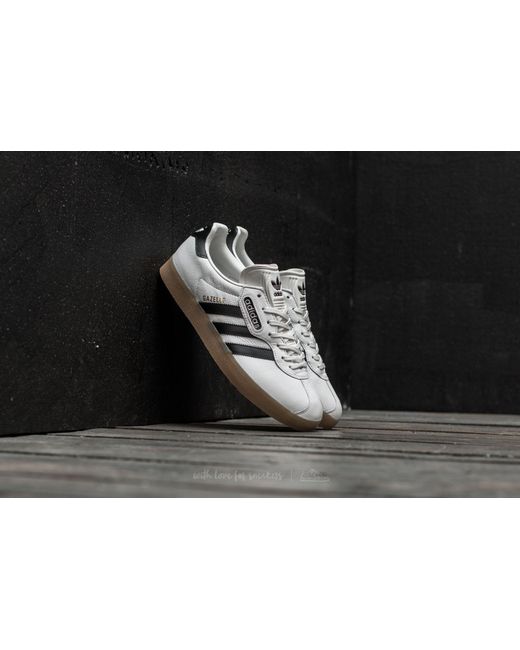 Adidas gazelle super core online black vintage white gum