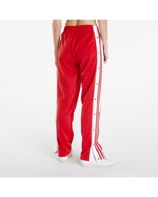 Red adidas button pants best sale