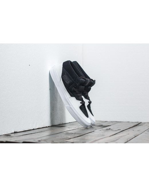 half black half white vans