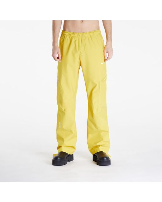 Nike X Nocta X L'art De L'automobile Tech Pants Vivid Sulfur/ Sail in het Yellow voor heren