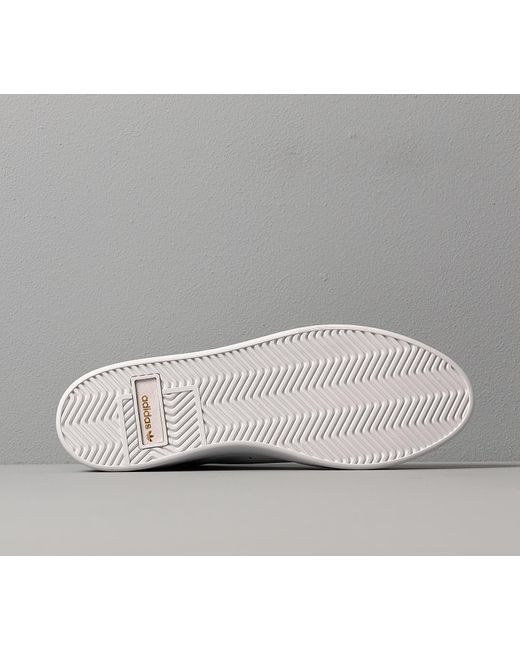 adidas originals sleek mid top trainer in white and pink