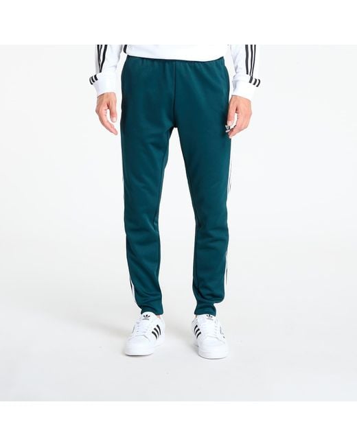 Adidas Originals Broeken Adidas Adicolor Classics Sst Track Pants Aurora Ivy in het Blue voor heren
