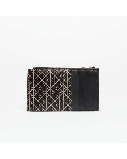 Emblem Aop Top Zip Cardholder di Calvin Klein in Black