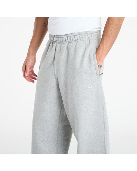 Nike Jogginghosen Solo Swoosh Fleece Open-Hem Pants Dk Heather/ Lt Smoke in Gray für Herren