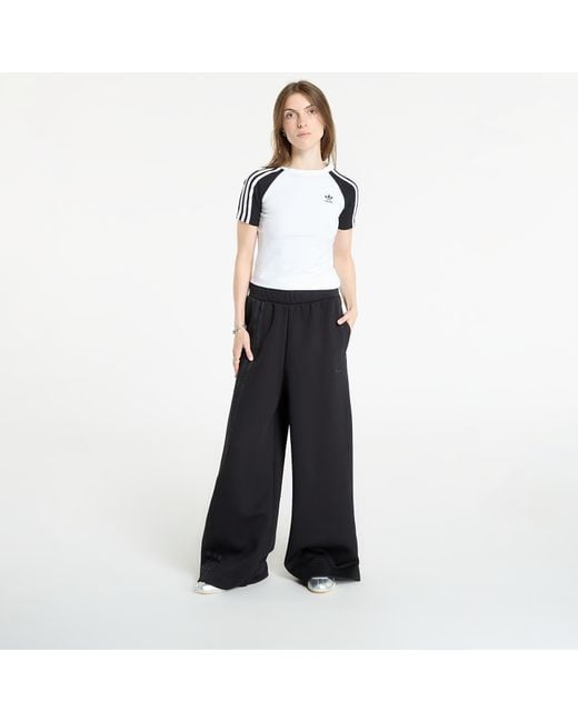 Pantalons adidas off placed 3-stripes wide pant m Adidas Originals en coloris Black