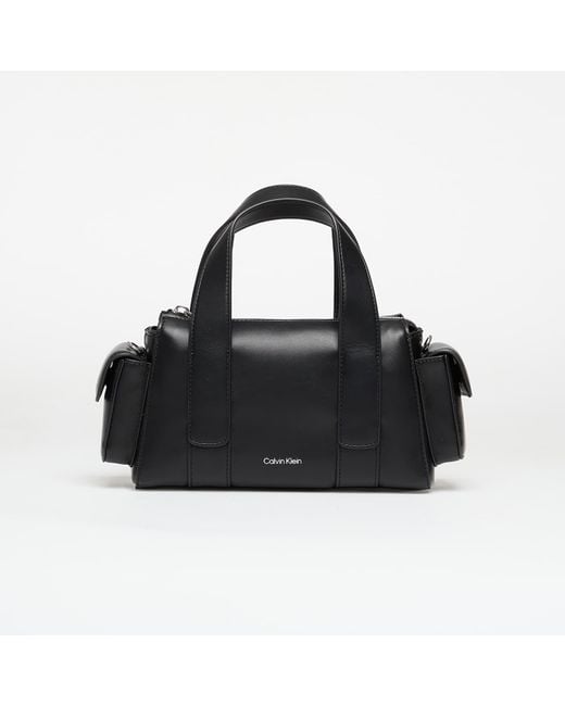 Borsa Webbing Strap Pocket Crossover di Calvin Klein in Black