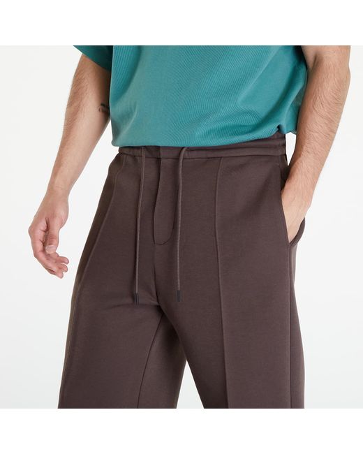 Nike Sportswear tech fleece reimagined loose fit open hem sweatpants in Brown für Herren