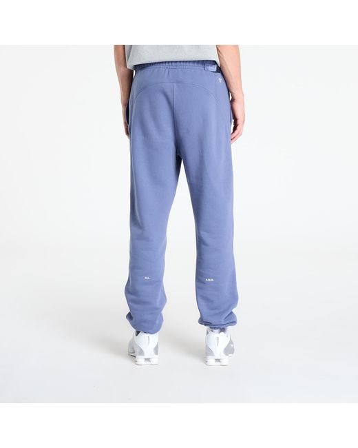 Pantalons x nocta fleece cs sweatpants diffused blue/ citron tint l Nike pour homme