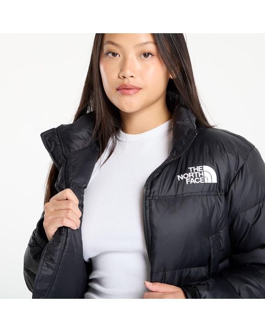 Giacca W Nuptse Short Jacket Tnf/ Tnf di The North Face in Black