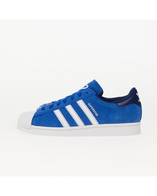 Blue adidas superstar shoes 2025