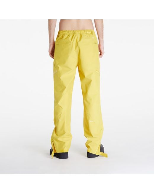X nocta x l'art de l'automobile tech pants vivid sulfur/ sail di Nike in Yellow da Uomo