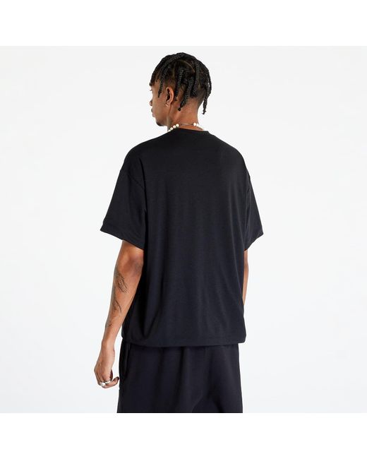 Nike T-Shirt Sportswear Tech Pack Dri-Fit Short-Sleeve Top in Black für Herren