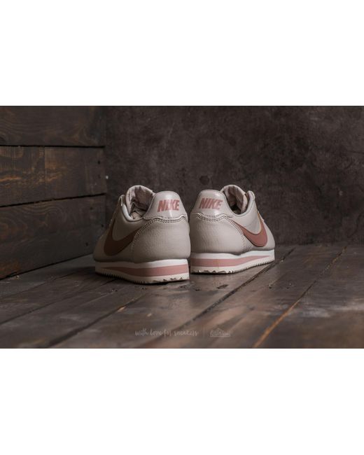 Nike cortez light bone particle best sale pink