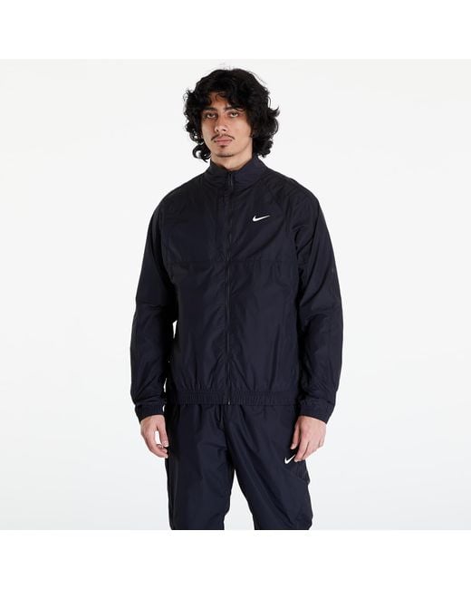Giacca X Nocta Woven Track Jacket di Nike in Blue da Uomo