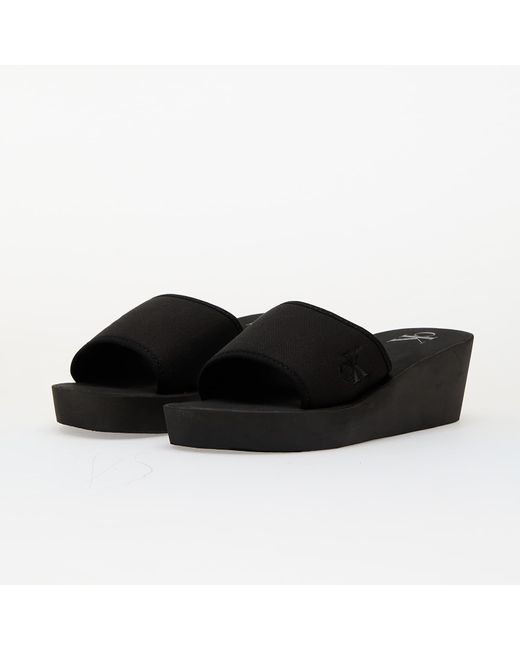 Sneakers Jeans Beach Wedge Slide Ca Eur di Calvin Klein in Black