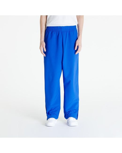 Pantaloni Adidas Adicolor Basketball Pant Lucid di Adidas Originals in Blue