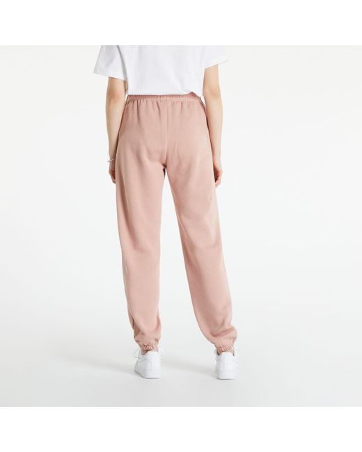 Nike Sportswear essential collection fleece trousers pink