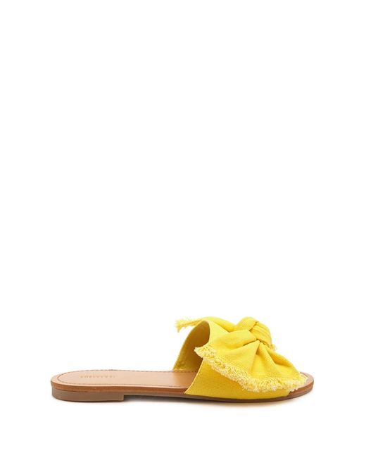 yellow flat sandals with bow