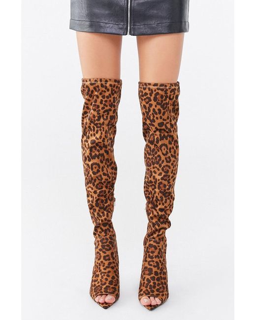 printed thigh high boots