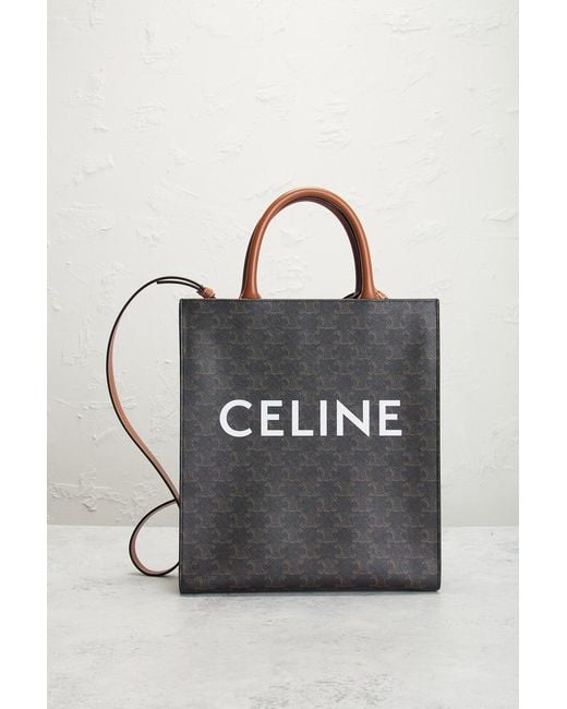 Celine Triomphe Vertical Cabas Tote Bag In Black Lyst celine-triomphe-vertical-cabas-tote-bag-in-black-lyst
