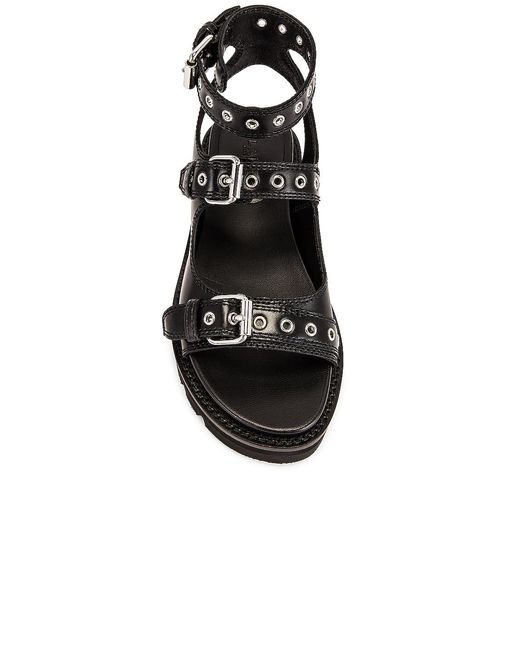 Alaïa Black Buckle Sandals