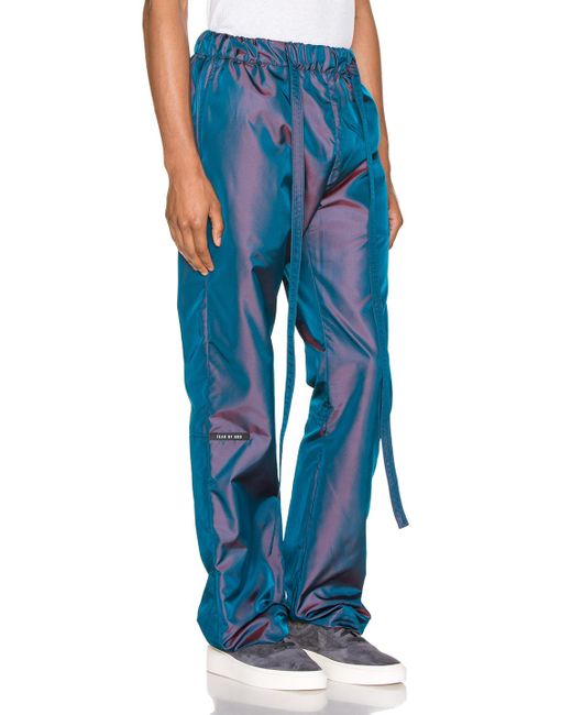 fear of god essentials iridescent nylon track pants
