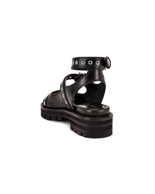 Alaïa Black Buckle Sandals