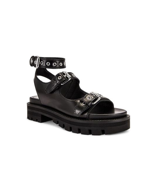 Alaïa Black Buckle Sandals