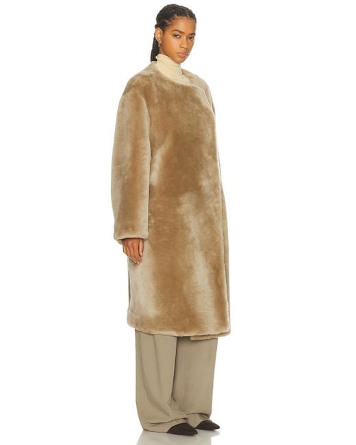 Totême  Natural Collarless Shearling Coat