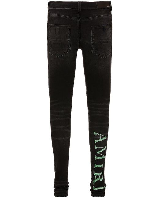Amiri Cotton Watercolor Logo Jean in 