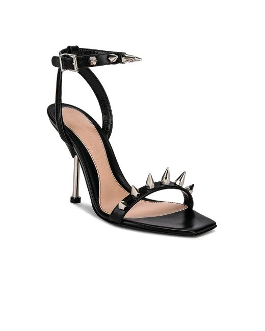 black sandals with silver studs