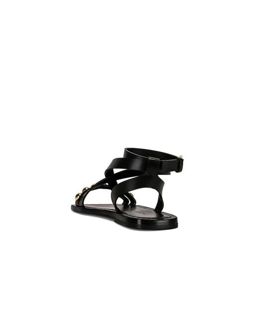 Alaïa Black Flat Ankle Strap Sandals