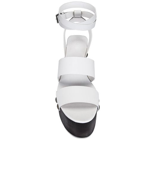 Alaïa Black Ankle Strap Wedges