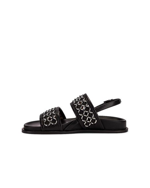 Alaïa Black Eyelet Slingback Sandals