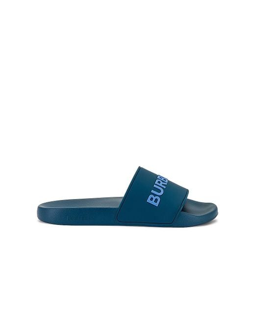 blue burberry slides