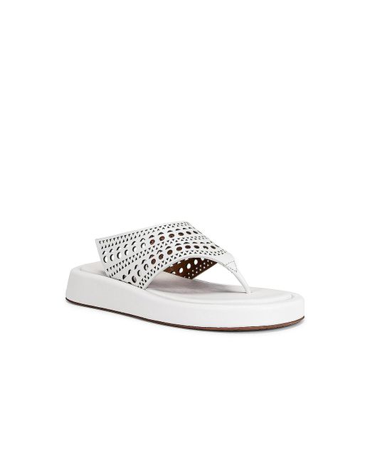 white flat platform sandals